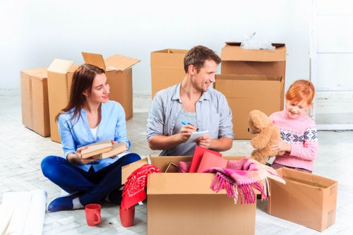 Southwoodford man with a van moving household items carefully