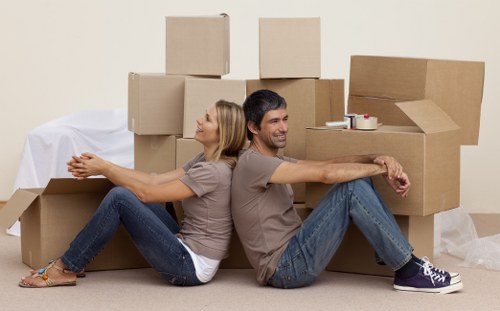 Household boxes and furniture prepared for removal truck hire