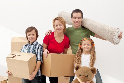 Packed boxes and furniture ready for removal in South Woodford