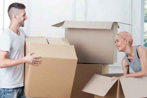 Organised office relocation process with labelled boxes